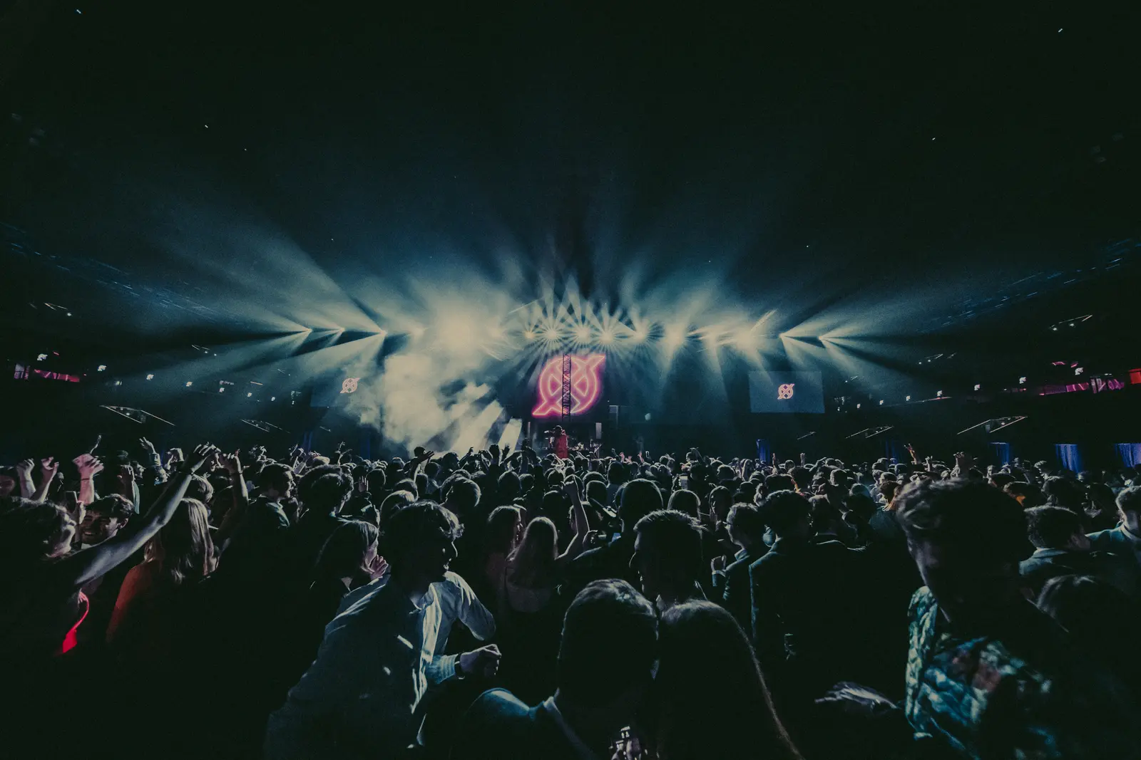 Crowd facing the stage at a festival night